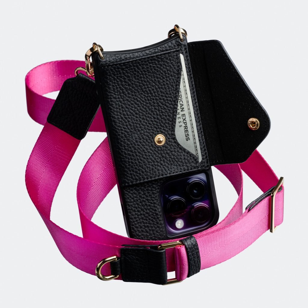 Black Bandolier-style leather crossbody phone case featuring a built-in wallet and secure card slots.